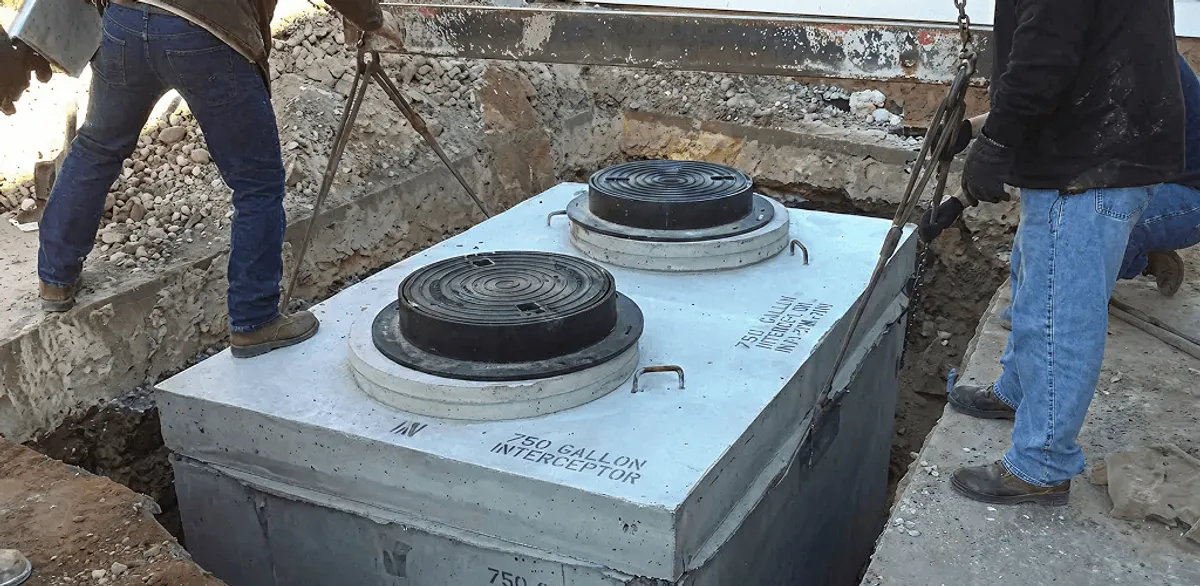 Grease trap installation for a commercial property drainage system in Nashua, NH